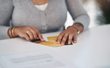 Canvas Print - I quite like this colour here. Cropped shot of an unrecognizable businesswoman sitting alone in her office and looking at a colour swatch.