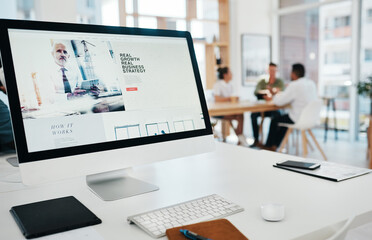 Aufkleber - Take a look at our website. Cropped shot of a website page displayed on an office computer while businesspeople work in the background.