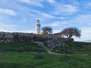 White lighthouse in the idyllic landscape