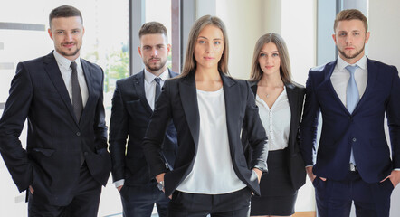 Wall Mural - Face of beautiful woman on the background of business people