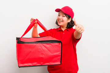 pretty hispanic girl feeling proud,smiling positively with thumbs up. fast food delivery concept