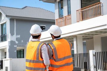 Aufkleber - Architect and engineer discussing planning for a building a new home at construction site,Architect watching some a construction,Business, Building,Industry,People concept.