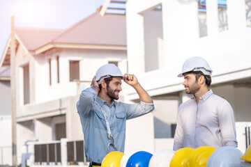 Poster - two architects working on blueprints