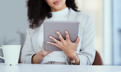 Poster - I love reading on my tablet. Shot of a businesswoman using her digital tablet.