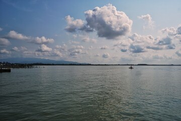 Sticker - clouds over lake