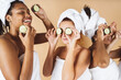 © PintoArt - Happy multiracial women having skin care spa day People self care concept