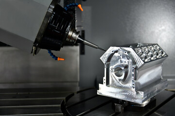Wall Mural - the 5-axis cnc mills machines for design configuration that utilizes a swivel head machine table and