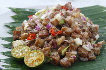 Freshly made Filipino food called Pork Sisig or chopped pork