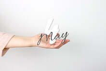 May 4th. Day 4 Of Month, Calendar Date. Calendar Date Floating Over Female Hand On Grey Background. Spring Month, Day Of The Year Concept.