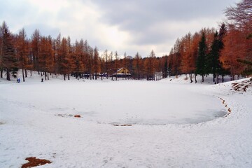 winter landscape with snow at Lago della Ninfa on the slopes of Mount Cimone, in Sestola, Modena, Emilia Romagna, Italy