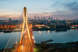 Fototapeta Most - Zachód słońca nad Warszawą, rzeka Wisła i most Świętokrzyski z lotu ptaka o zmierzchu