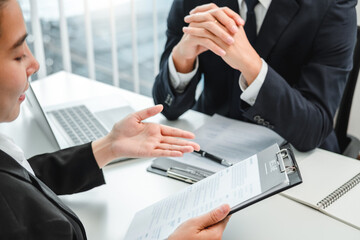 Wall Mural - Senior manager HR reading a resume during a job interview employee young woman meeting Applicant and recruitment. Interview concept