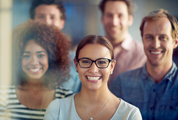 Poster - the creative planning team. portrait of a group of colleagues standing together.
