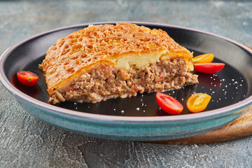 Canvas Print - Pie with beef Tourtier and cherry tomatoes. Pie with minced meat