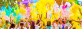 Holi Colorful festival of colored paints of powders and dust. People covered with colored powder rejoice celebrate and dance. Holiday bright colors for the entertainment of people.