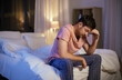 © Syda Productions - sleep disorder, insomnia and mental health problems concept - unhappy man in pajamas sitting on bed at night