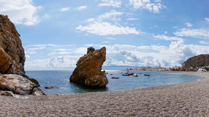 Sticker - picturesque Andalusian coastal village of Calahonda and empty beach in the foreground