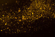 Golden glitter dust shiny sparkling bokeh abstract background