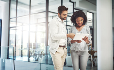 Poster - Without communication, collaboration is impossible. Shot of two businesspeople discussing something on a digital tablet.