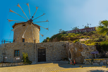 Wall Mural - DATCA, MUGLA, TURKEY: The old Turkish windmill Datca Vineyard, now a cafe and wine tasting.