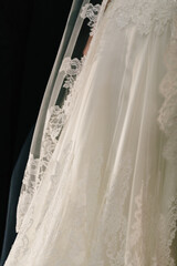 Wall Mural - Close up of the skirt of a wedding dress