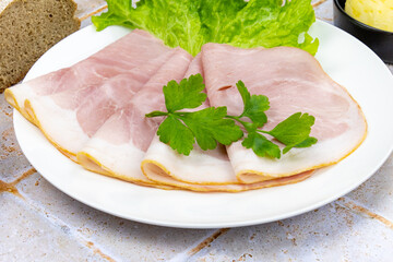 Wall Mural - sliced pork ham with lettuce and bread