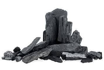 Wall Mural - Pile of natural black activated charcoal isolated on a white background. Traditional charcoal.