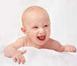 © Tabitha R/peopleimages.com - Hes his moms little angel. Cropped shot of an adorable baby boy in a studio.