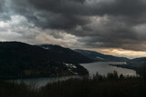 Fototapeta  - Zachód słońca nad jeziorem Żywieckim, chmury, góry i woda.
