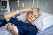 © Rido - Woman suffering in hospital