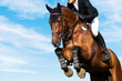 Equestrian Sports photo themed: Horse jumping with blue sky background, Show Jumping, Equestrian Sports, Horse riding,
