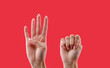 © claudiovaldes - Gestural sign of help male violence on red background