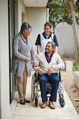 Poster - Supporting her spouse through the senior years. Shot of a senior woman and her husband with a nurse at a retirement home.