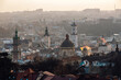Beautiful view of rooftops of ancient Lviv city center over the sunset time