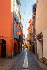 Wall Mural - Collioure traditional village street with colorful houses on the south of France