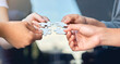 © Nikish Hiraman/peopleimages.com - Lets put it all together. Closeup of businesspeople about to put four puzzle pieces together.