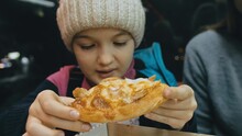 Child Eat Pizza Cheese Four. Close Up Of Young Girl Woman Mouth Greedily Eating Pizza And Chewing In Outdoor Restaurant. Kid Children Hands Taking Piece Slice Of Hot Tasty Italian Pizza From Open Box.