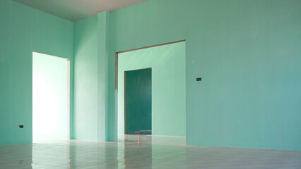 Wall Mural - Perspective side view of 3 door frames on green concrete wall with tile floor inside of incomplete house construction site