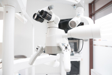 Close up photo of some white dentistry equipment shot in a clean clinic.