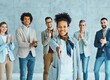 © Lumos sp - young business people meeting office handshake hand shake shaking hands teamwork group contract agreement black happy smiling success partnership introduction greeting businesswoblack african american