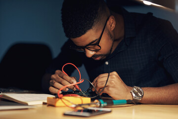 Aufkleber - The expert to tackle any tech challenge. Shot of a young technician repairing computer hardware.