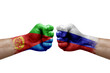 Two hands punch to each others on white background. Country flags painted fists, conflict crisis concept between eritrea and russia