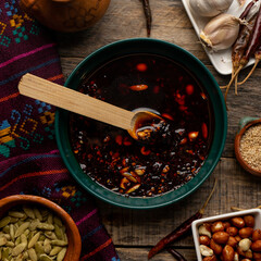 Wall Mural - Chili oil sauce with sesame and peanuts called macha. Mexican food