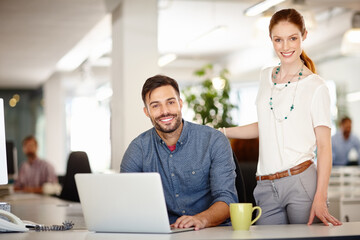 Poster - Were right on schedule with our deadlines. Portrait of two colleagues working together in an office.