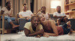© Kobus Louw/peopleimages.com - Movies night with the besties. Shot of a group of a diverse group of friends relaxing in the lounge at home.