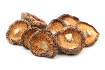 Poster - Dry Mushrooms isolated on white background. Selective focus