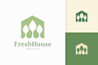 Nature green house logo with tree and leaf shape