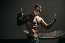 Sexy Guy Shaving Beard. Barber Blade. Man With Vintage Razor. Shaving Brush With Foam Cream.