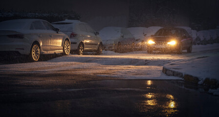 Wall Mural - car light in blizzard, front view