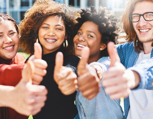 Poster - Youve got our vote. Cropped portrait of a diverse group of college friends giving thumbs up while standing outside.